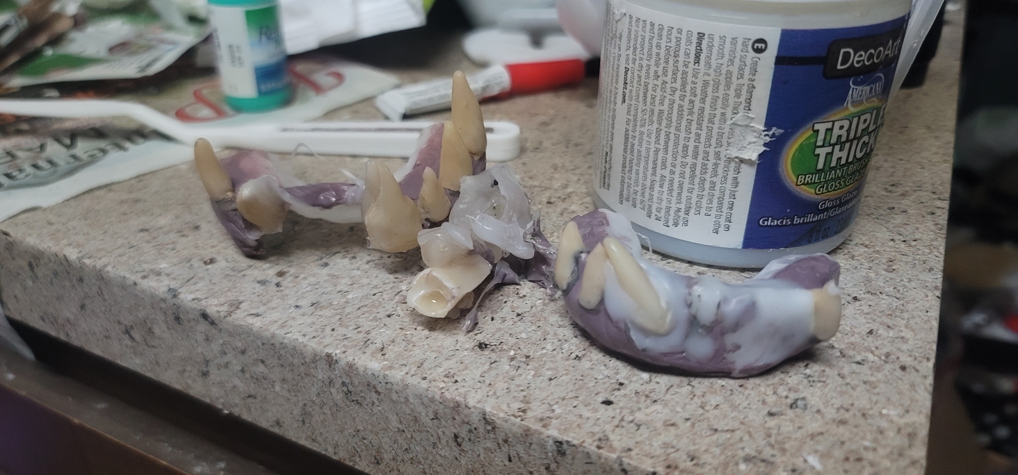 Was curing the final two teeth (I ran out of composite and had to order more) when my shielding solution (Cure under steel bowl so no one would need eye protection) pushed the teeth into the hot face of the UV lamp- and melted the thermoplastic. 