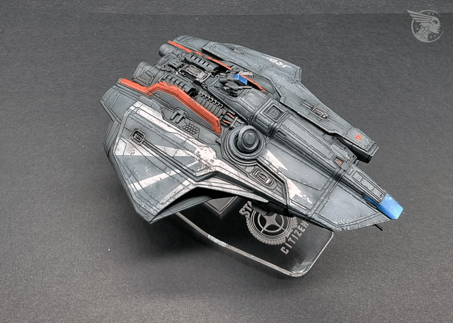 Acrylic colours were used as a basecoat. Most markings, logos and the distinct halo-like design were masked and airbrushed onto the model.