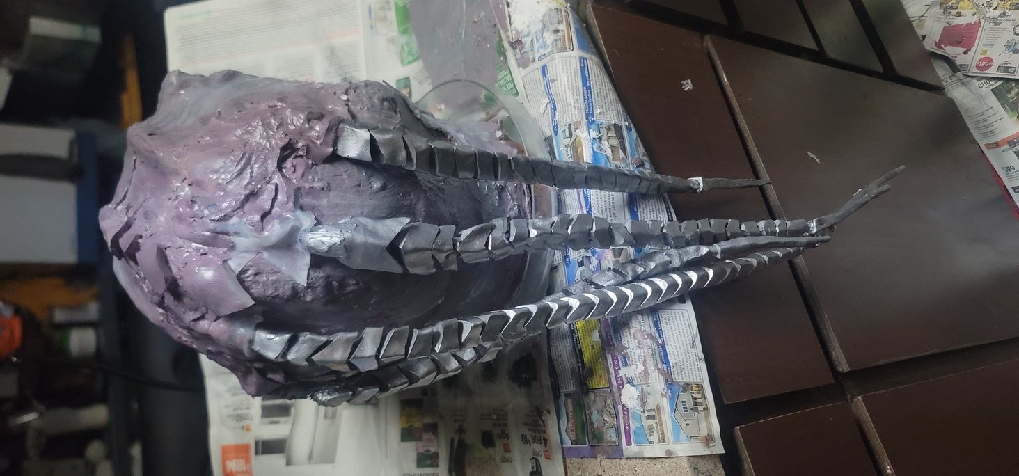 glued some nylon stocking to the end to give it some "skin" to hang from and spread the load out