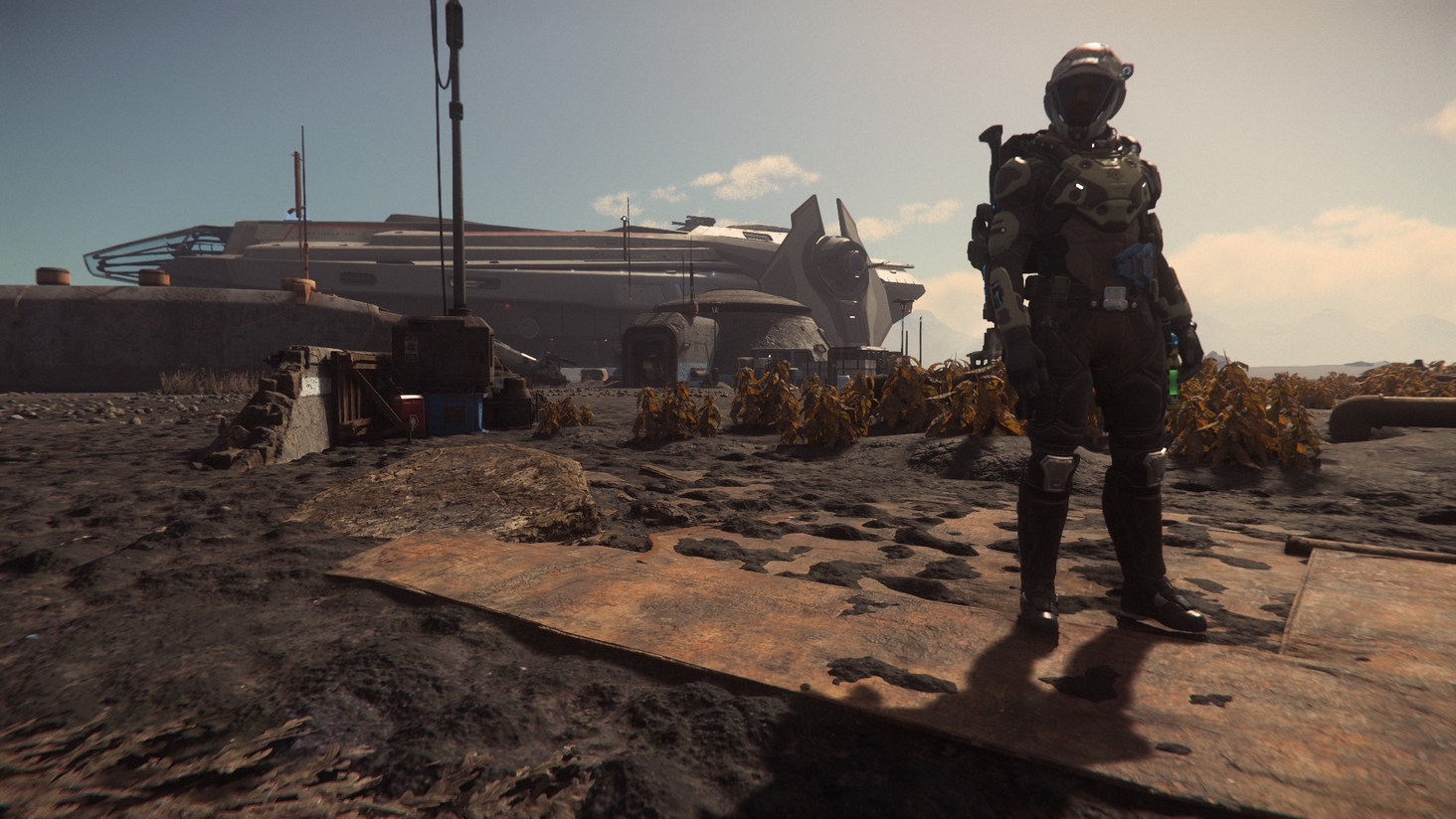 With the Carrack-class explorer Quantum Ranger and a colonial outpost rising up in the background, TekkerTen takes in the tidepools of Bloom in the wan light of the Pyro star.