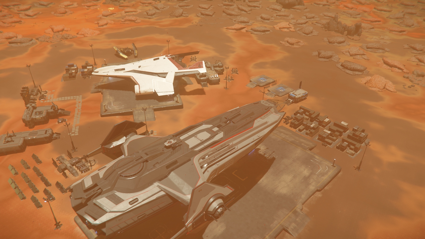 Just because this image looked good, my Carrack and my son's C2 parked for loading.