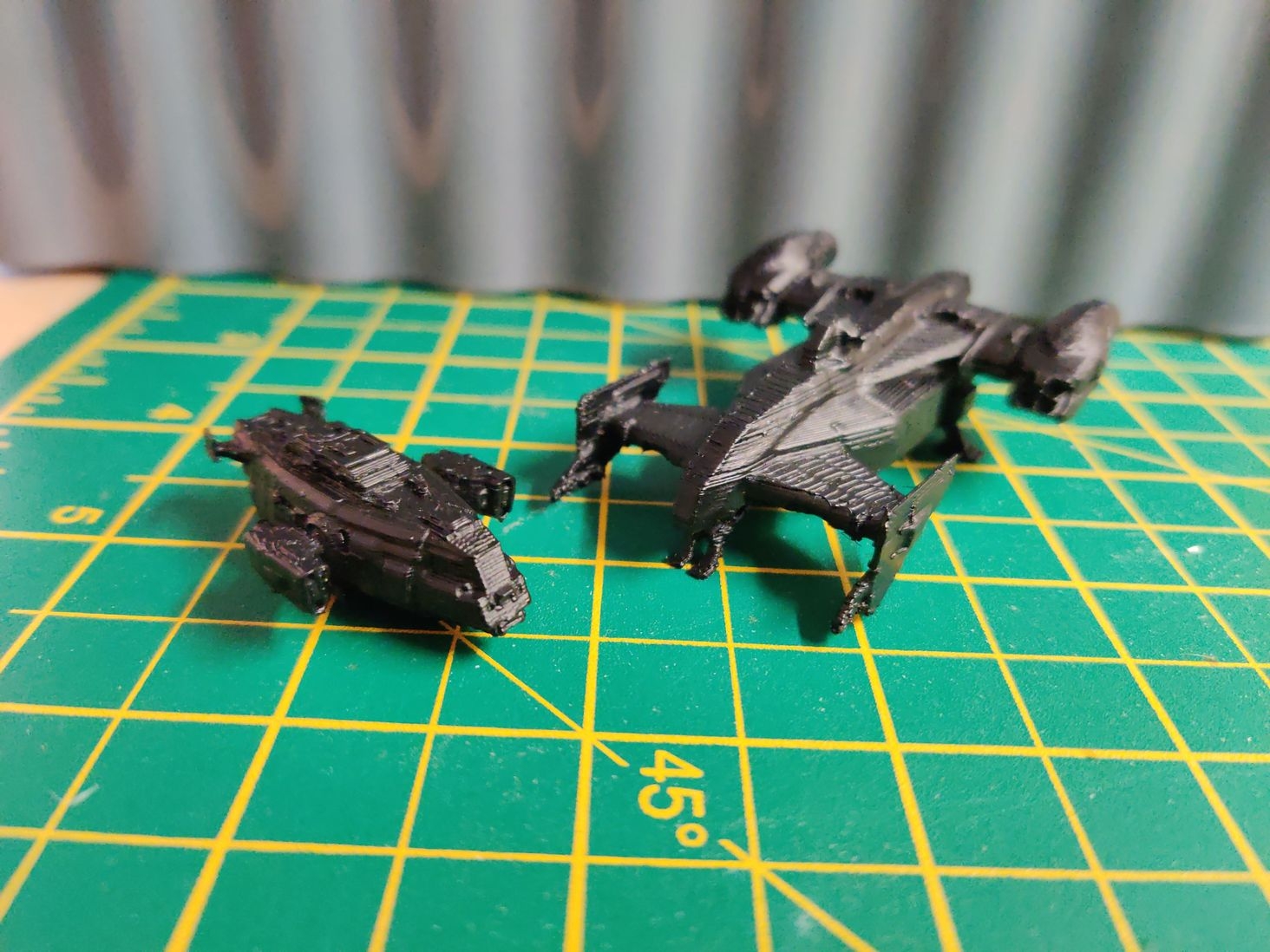 Small ship models produced using the method in the guide, without any other messing around in Blender apart from to add landing gear and remove really small details