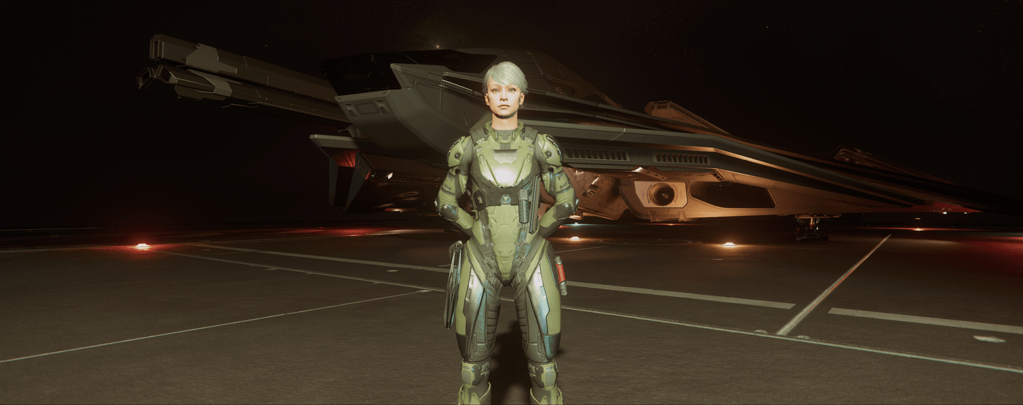 Character standing at attention in front of an Ares Inferno.