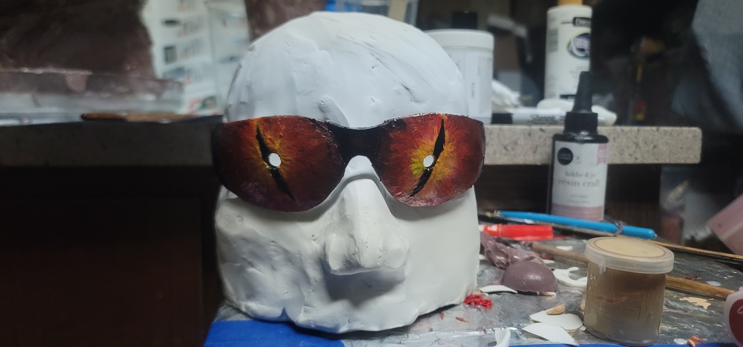 modeling clay (plasticine) used to hold some of the shape of the polymer clay. I used a heat gun to set the exterior before baking the whole thing (I did NOT bake the plasticine)

