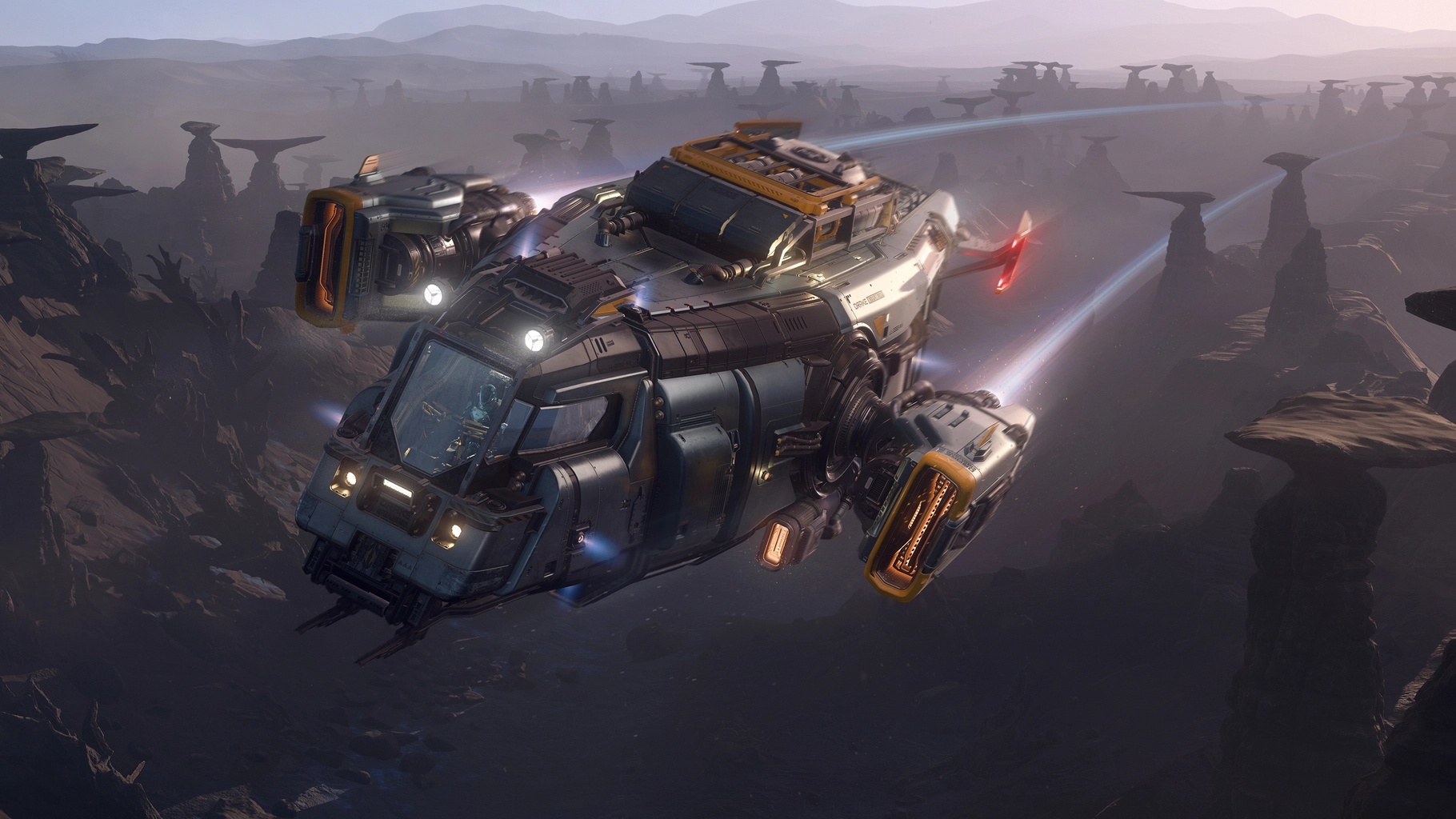 Drake Cutter Rambler flying through a canyon