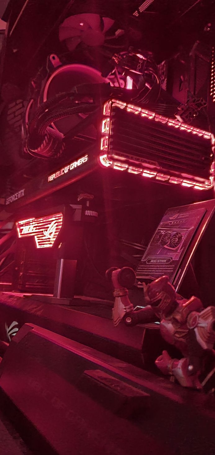 Nvidea ROG Strix RTX 4070Ti OC Edition GDDR6X 12GB 192-bit (we don't talk about the bits it's a sore spot for me) it came with a collectors card & yes that is a Crimson Thunder Ranger holding a dumbell He's ticked he can't atlas style hold the GPU!