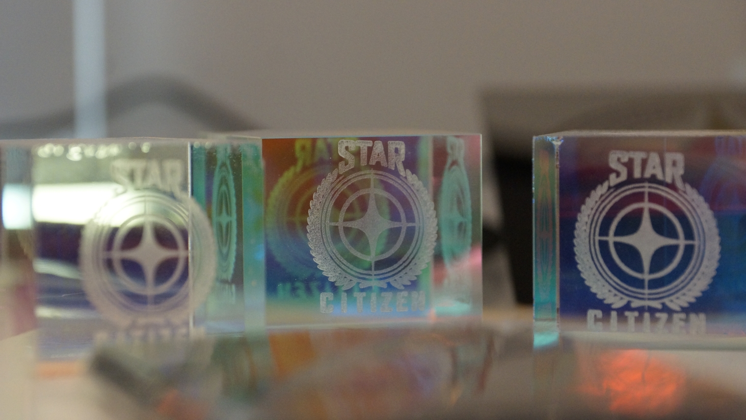 Pretty prism cubes with logo in the raffle